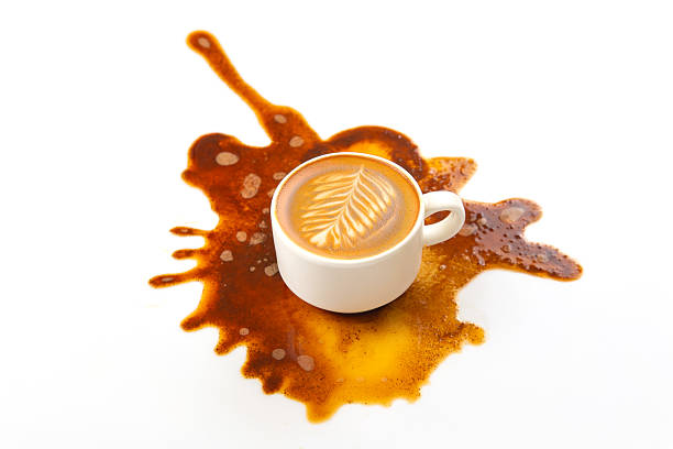 istock A spilled espresso cup on a white surface, with rich brown coffee creating a dramatic splash pattern, perfect for concepts of accidents or morning mishaps 2209988042