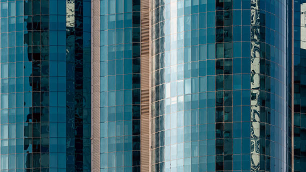 istock many windows and walls facade of a modern skyscraper without people 2210009025