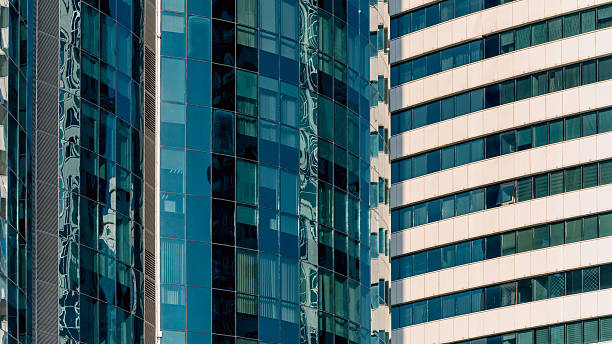 istock many windows and walls facade of a modern skyscraper without people 2210009513