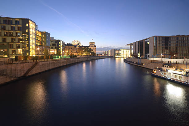 istock Berlin Riverfront with Reichstag and Modern Architecture at Night 2210011922