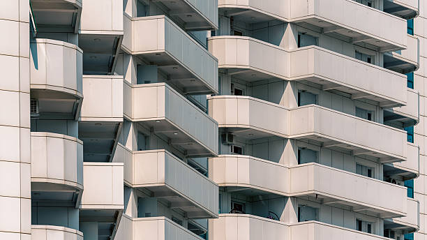 istock many windows and walls facade of a modern skyscraper without people 2210013030