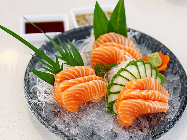 istock Salmon Sashimi - Japanese food style, selective focus point 2210014086