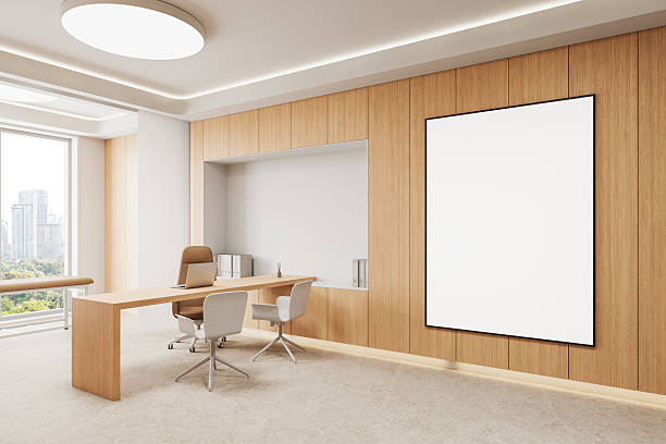 istock Modern office interior with large blank poster on wooden wall. 3D Rendering 2210014165