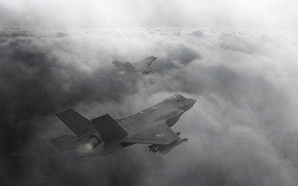 istock Air Force F-35 Fighter Jets flying over clouds. High Above The Clouds. 2210015326