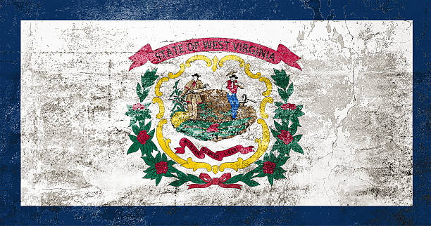 istock West Virginia State Flag. Dirty West Virginia state flag on the wall. 2210017757