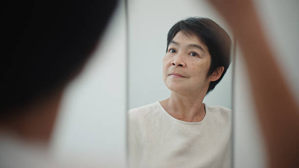 istock Adult self reflection at home. 2210020617