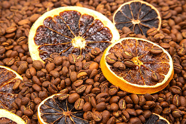 istock A sensory delight featuring dried orange segments layered over rich coffee beans. coffee aroma and taste descriptors 2210031951