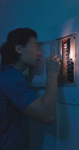 istock asian man with power outage 2210039654