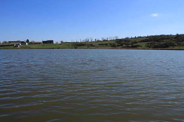 istock A body of water with a sign on it 2210054998