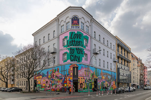 A colorful mural with the text \