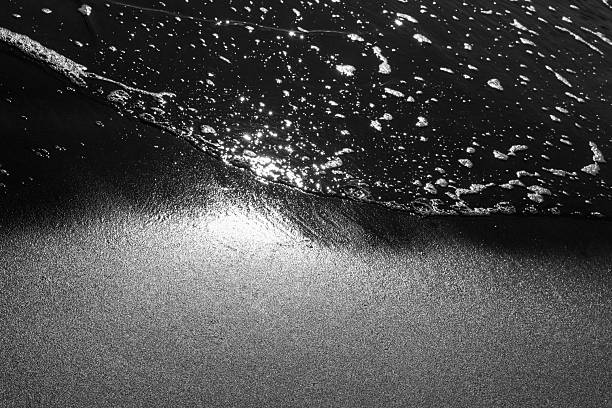 istock Black and white photo of sea wave 2210059536