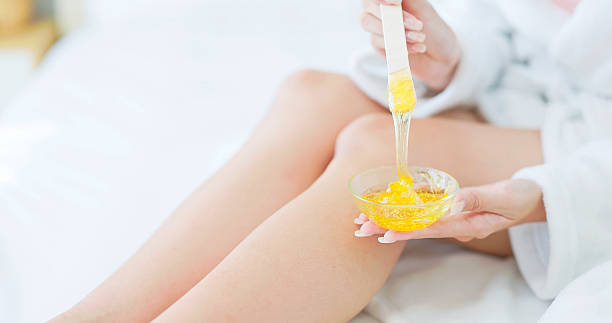 istock beauty hair removal hot wax 2210060437
