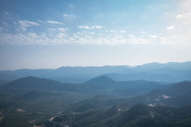 istock Magnificent nature with mountains and forests. Beautiful sunny valley with blue sky in summer. Aerial view with drone. 2210061847