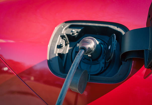 Plugging in electric car for charging