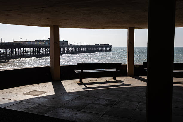 Viewing the sea from promenade bench