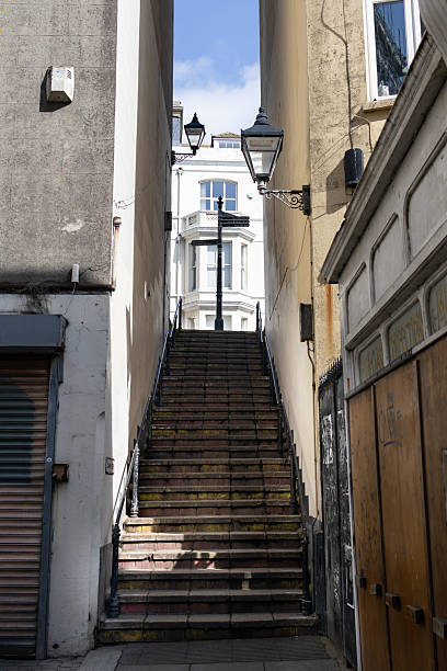 istock View From Below of Narrow Stairwell 2210066120