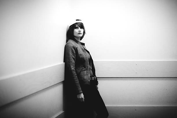 istock Black and white portrait, woman with Cap 2210068743