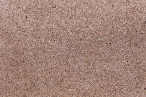 istock Timeless and neutral texture of a sand-colored tile 2210074112
