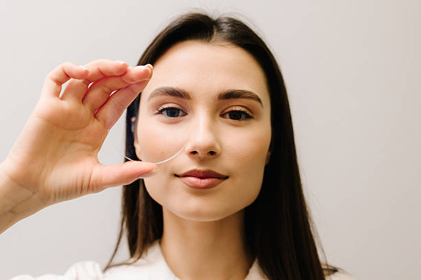 istock Girl with eyeglass lens, showcasing its clarity, precision, and advanced optical technology. Designed for vision correction, anti-glare protection, and premium eyewear solutions. 2210075553