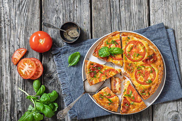 istock Freshly baked Italian Tomato Cheese Pie, top view 2210076003