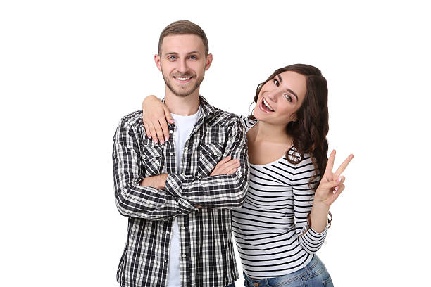 istock Beautiful young couple isolated on white background 2210080554