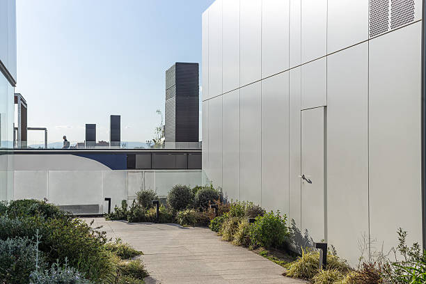 istock Modern rooftop garden enhancing building sustainability and environment 2210080855