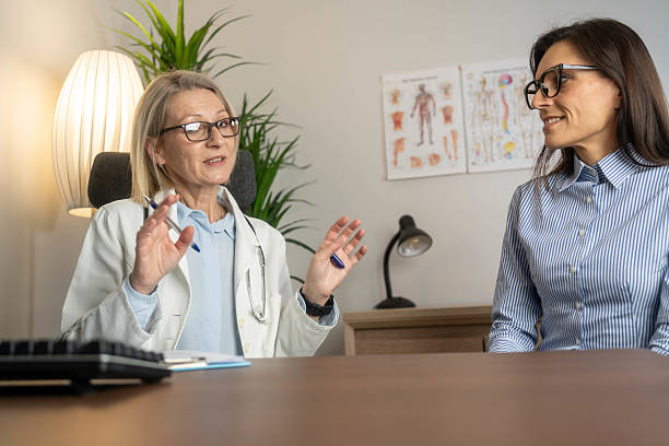 istock Doctor giving advice to patient 2210084571