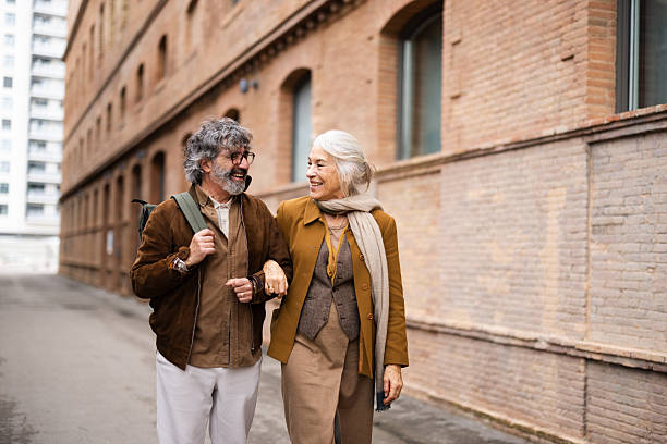 istock Elderly couple savoring a city break while wandering through the streets 2210086782