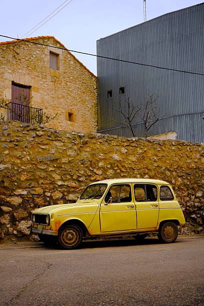 istock Old yellow vehicle parked on the street 2210087178
