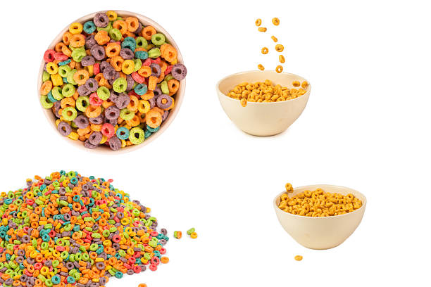 istock Colorful rings cereal spill out into a bowl. Breakfast. Isolated. 2210088937