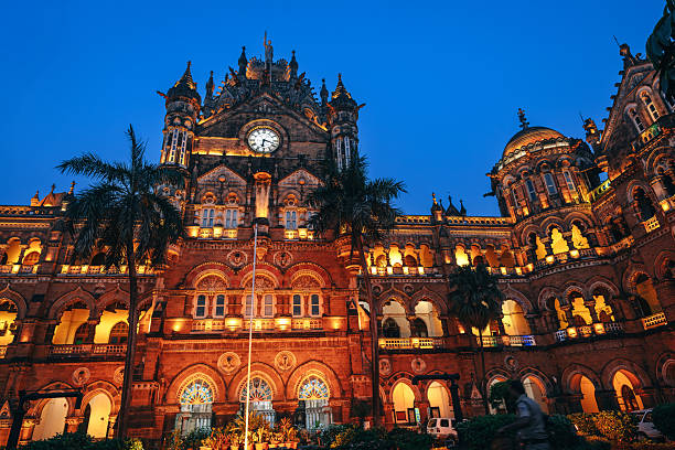Chhatrapati Shivaji Terminus Lit Up During Sunset With Victorian Gothic Architecture stock photo