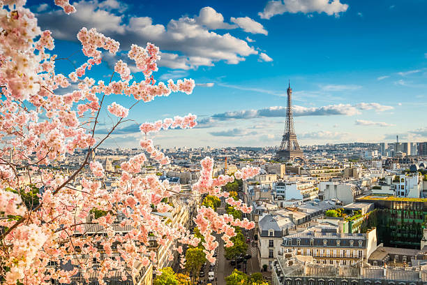 istock eiffel tour and Paris cityscape 2210099129