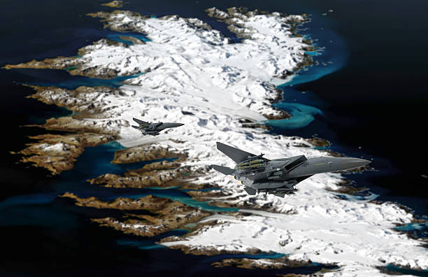 istock F-15 Jet Fighters flying over Brogger Glacier. 2210101330