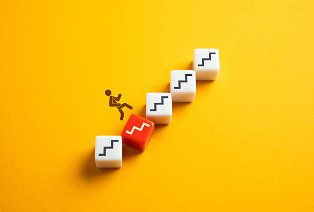 istock A person encounters a problem when climbing to a goal. A change in plans. A challenge with a catch. Caution and foresight. Overcoming failure. Endure this stage and don't give up. 2210104282