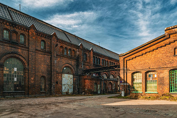 istock Old brick warehouses at the historic shipyard in Gdansk 2210114876