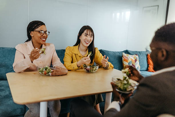 istock Business colleagues having lunch break in office 2210134700