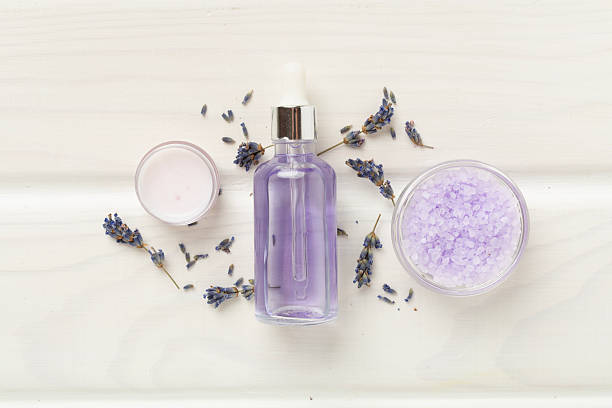 istock Lavender spa cosmetic on wooden background, top view 2210140770