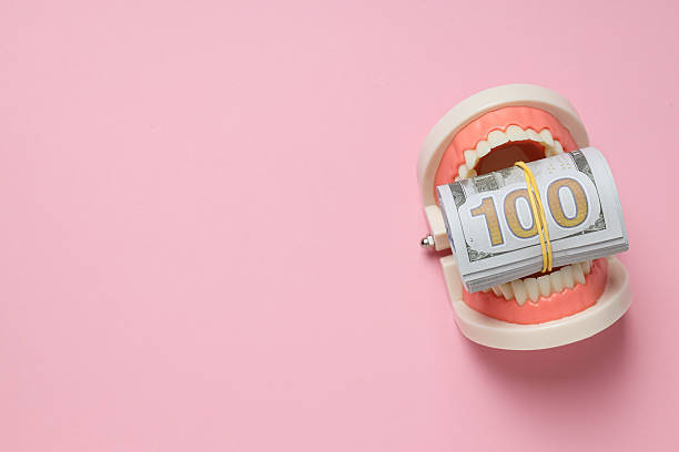 istock Decorative jaw and money on pink background, space for text 2210143806