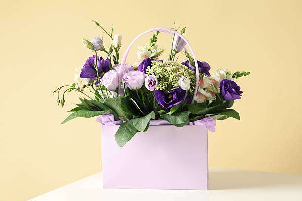 istock Beautiful, fresh flowers in a gift bag. 2210156477