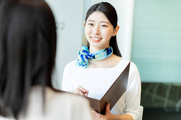 istock young woman at the reception 2210157664