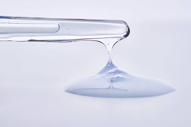 istock Pipette with delicate blue serum close-up. 2210163641