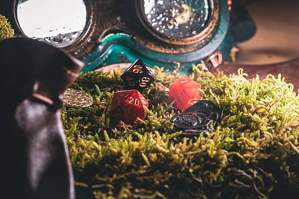 istock RPG Dice And Tokens On Moss With Steampunk Goggles 2210164958