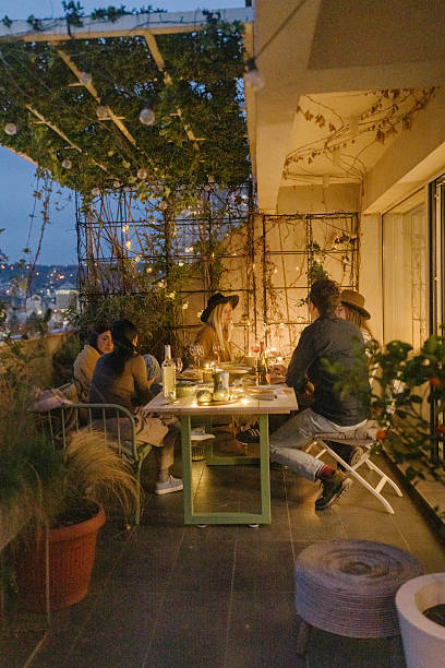istock Balcony dinner party with friends 2210165141