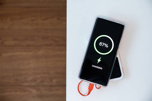 istock A mobile phone being charged using a power bank is on the table 2210167659