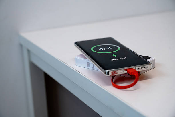 istock A mobile phone being charged using a power bank is on the table 2210167662