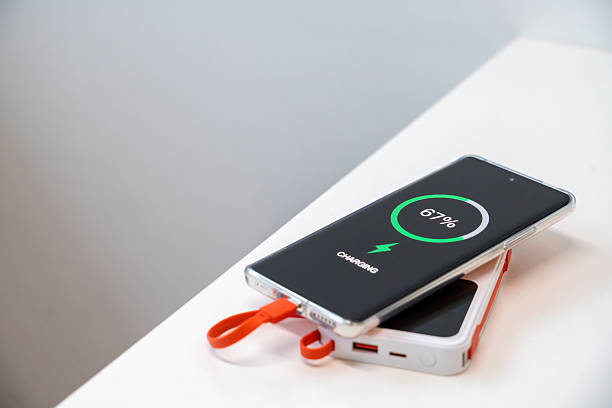 istock A mobile phone being charged using a power bank is on the table 2210167663