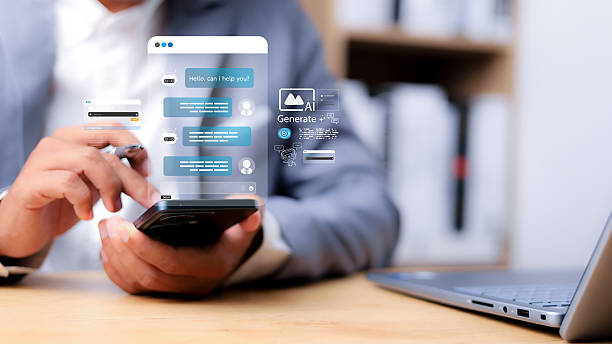 istock Chat with AI or Artificial Intelligence. Young businessman chatting with a smart AI or artificial intelligence using an artificial intelligence chatbot developed by OpenAI. 2210168700