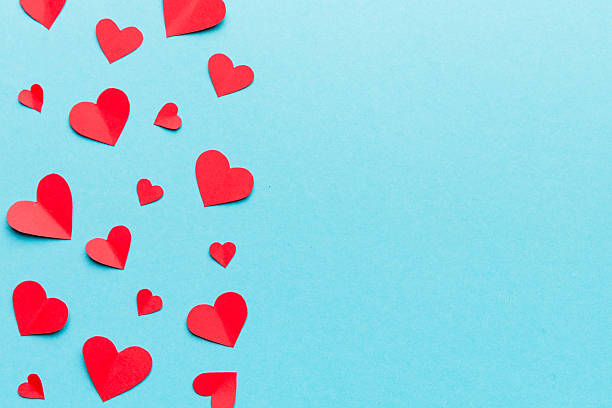 istock Valentine day background with red hearts, top view with copy space 2210168821