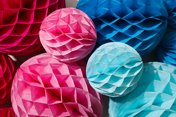 istock Blue and pink paper balls, close up 2210170828