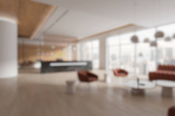 istock Modern interior of a blurred office lobby with reception desk and seating area. 3D Rendering 2210178626